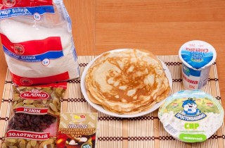 Блинчики с творогом и изюмом, запеченные в духовке